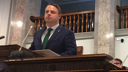 Brisbane’s new Lord Mayor Adrian Schrinner makes his first speech with new deputy mayor Krista Adams watching on.
