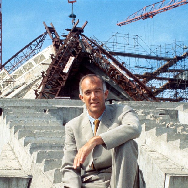 Utzon in front of the partially constructed Opera House in 1965.