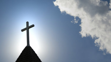 A cross on a church. 