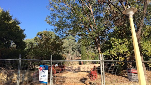 62 Hawker Street, site of a former Mr Fluffy home, is selling for $1.025 million in Torrens.