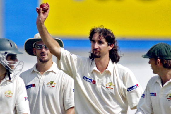 Five-for: Australia\'s Jason Gillespie, displays the ball after taking five Indian wickets in 2004/.