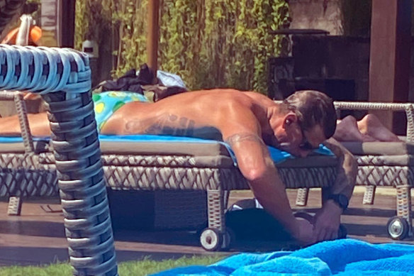 Ben Roberts Smith relaxing by a pool in Bali.