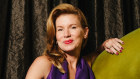 Wearing Yves Saint Laurent on the sofa she designed, brought to life by Joseph Hodgson.