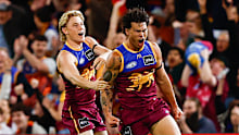 Cam Rayner of the Lions celebrates a goal.