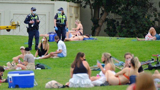 Police patrolled St Kilda as people enjoyed the warm weather.
