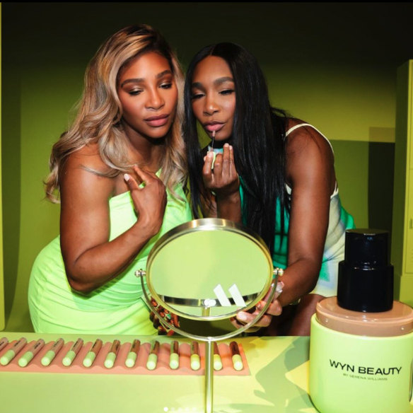 Serena and Venus serve up Serena’s make-up line, Wyn Beauty, in a tennis-green colour scheme.