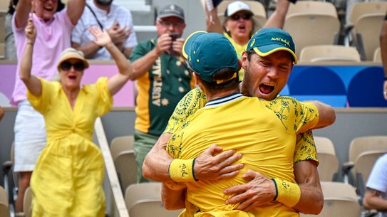 Matt Ebden and John Peers celebrate gold at Roland-Garros.
