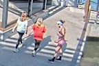 Brisbane woman Kayley Koppa (right), who suffered a cardiac arrest while running, has been reunited with several strangers who helped save her life.