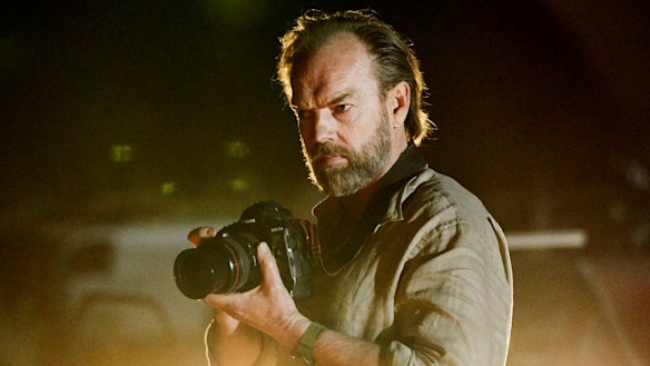 Hugo Weaving as a war photographer in Hearts and Bones. 
