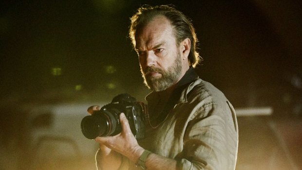 Hugo Weaving as a war photographer in Hearts and Bones. 