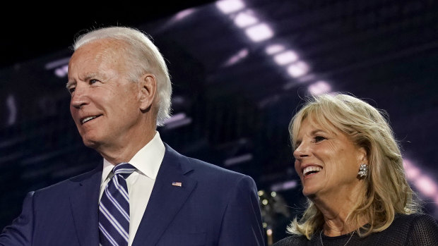 Former Vice President Joe Biden, Democratic presidential nominee, left, and wife Jill Biden stand on stage during the Democratic National Convention at the Chase Center in Wilmington, Delaware, US.