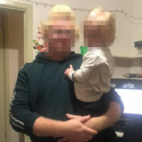 The father and alleged murderer from Lalor Park with one of the children.