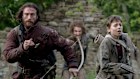 Aaron Taylor-Johnson (left) and Alfie Williams hotfoot it as zombies descend.