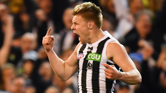Pies stun Tigers to march into grand final