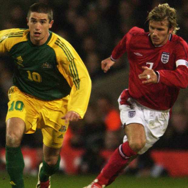 Harry Kewell goes past David Beckham in the famous friendly match between Australia and England at Upton Park in 2003.