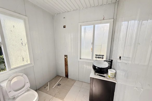 The bidders planned to finish the home and use it as an investment.