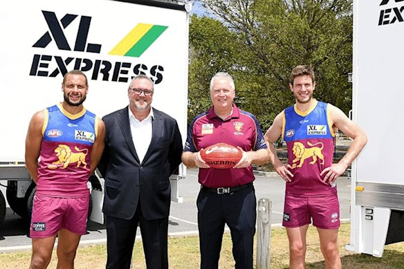 XL Express managing director Colin Mallory (second from left) with Brisbane Lions chief executive Greg Swann and Lions players Cam Ellis-Yolmen and Grant Birchall at the sponsorship announcement in 2019.