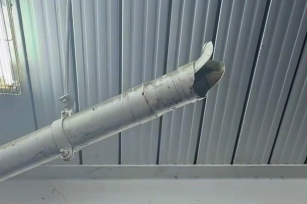 Broken pipes were also seen hanging from the ceiling.