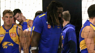 Nic Naitanui on crutches in the West Coast rooms after his second ACL injury last season.