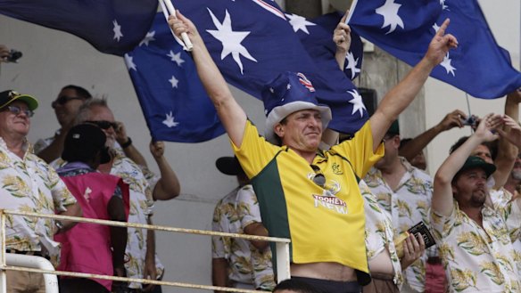 Australia supporters celebrate Steve Smith’s century on day one of the second Test against the West Indies at Sabina Park, Jamaica, in 2015. 