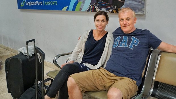 Scherie and John Todd, from Northbridge, Sydney wait at Lombok Airport on Tuesday. 