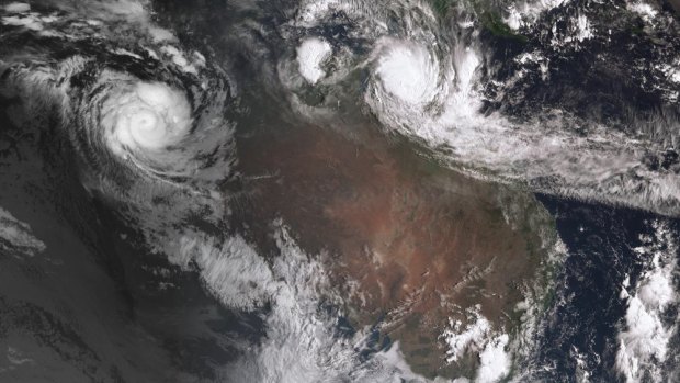 NASA satellite photo showing twin cyclone systems over northern Australia on Friday morning.