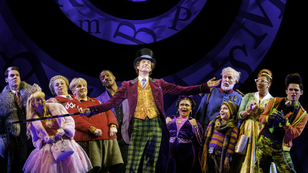   Paul Slade Smith as Willy Wonka with the lead cast of Charlie and the Chocolate Factory - The New Musical. 