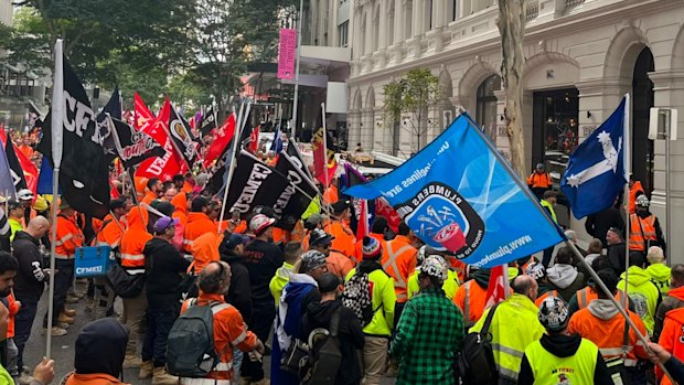 CFMEU workers march through Brisbane streets to protest safety concerns.