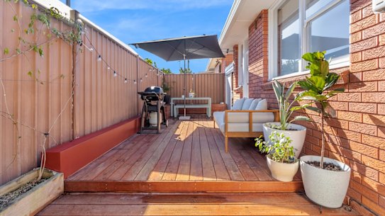 The garden villa at 4/37 Verdun Street, Bexley includes an enclosed deck ideal for the young family who were the winning bidders.