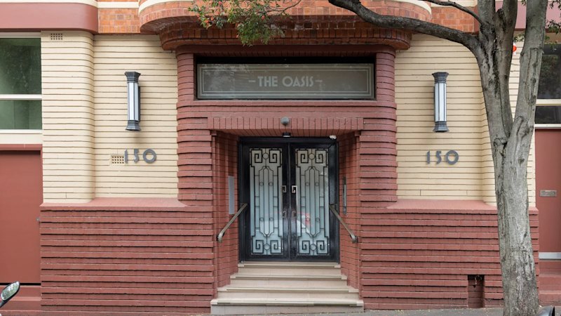 Art deco apartment with train line views sells for $789,000