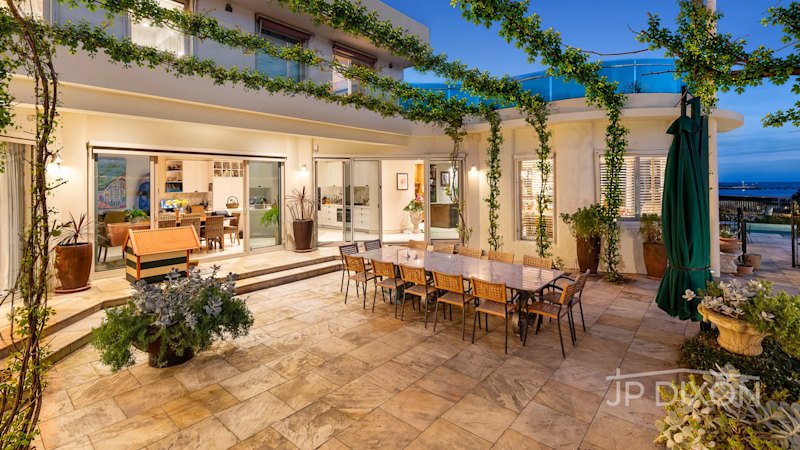 Downsizer lists two beachfront Golden Mile mansions for $96 million