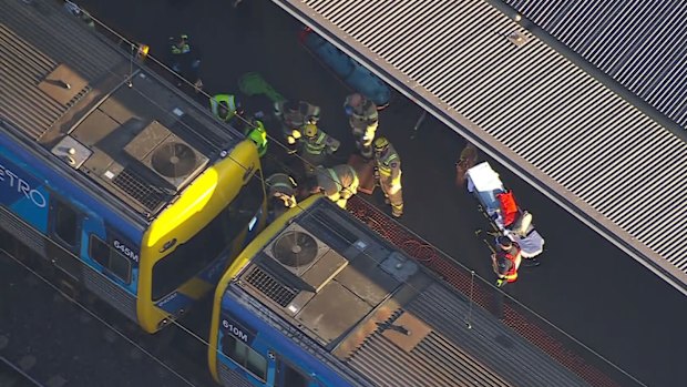 Emergency services at North Melbourne station on Monday afternoon.