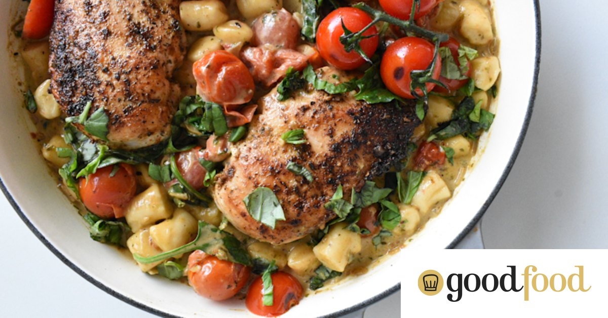 Creamy pesto chicken with cherry tomatoes and basil