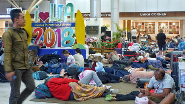 Hundreds of tourists slept at Lombok Airport waiting for the first chance to leave.