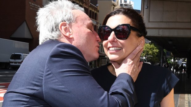 Michael Cranston kisses his wife Gloria after he was found not guilty.