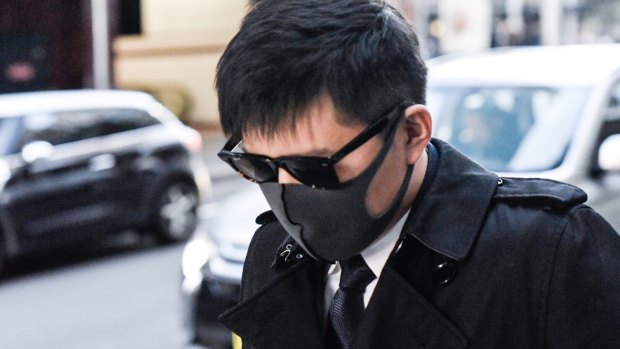 Longwei Xu leaves court during his trial.