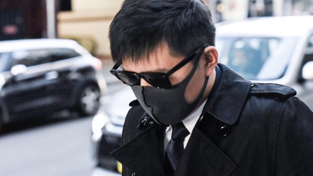 Accused Longwei Xu leaves court on Wednesday. 