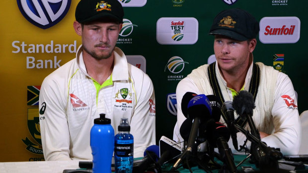 Caught red-handed: Cameron Bancroft and Steve Smith face the media in Cape Town