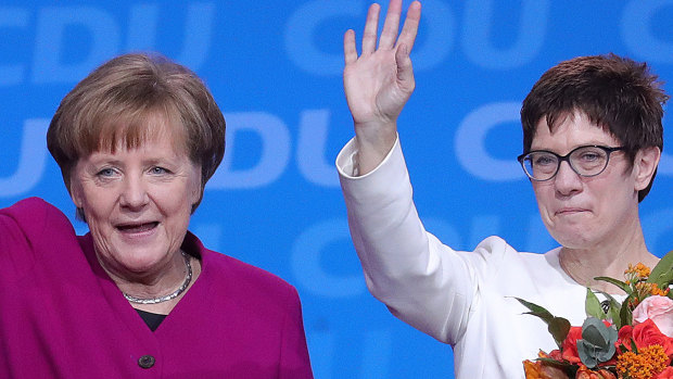 Angela Merkel, Germany's chancellor and Christian Democratic Union (CDU) leader, left, and Annegret Kramp-Karrenbauer, general secretary of the Christian Democrat Union (CDU).