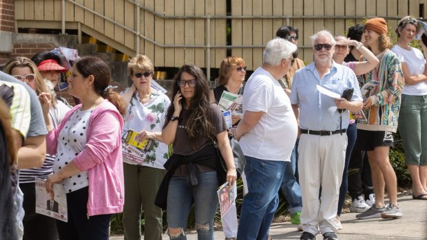 Lord Mayor Adrian Schrinner has hit out at the Queensland Electoral Commission over long queues and a shortage of staff and ballot papers at many booths.