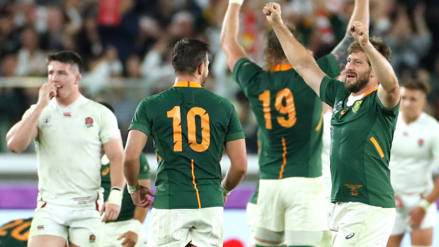 Handre Pollard and Frans Steyn celebrate after the final whistle blows.