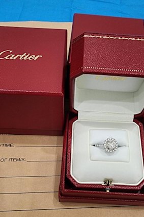Investigators also seized a Cartier diamond ring.