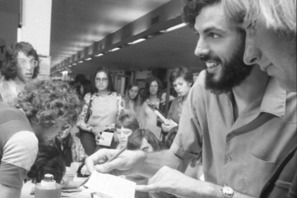 Students enrol to vote at a table set up in the Union building at Monash University after the voting age was lowered to 18.