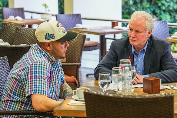 Bukele posted photos of US Senator Chris Van Hollen seated with Kilmar Abrego Garcia, including with the drinks, garnished with maraschino cherries.