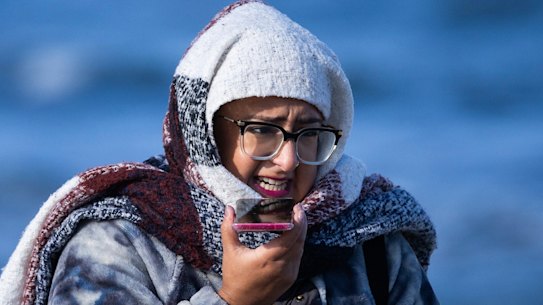 People braving the cold weather on the St Kilda foreshore.