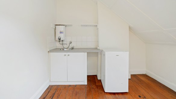This top floor Glebe studio is for rent for $230 a week and shares a bathroom on level two. 