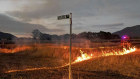 CFA firefighters complete a planned burn in Dunkeld ahead of forecast dangerous bushfire conditions on Boxing Day.