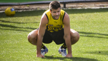 In doubt: A trouble knee could sideline Tigers' skipper Trent Cotchin from Sunday's Fremantle clash at the MCG.