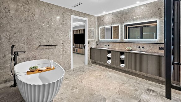 The house features five bathrooms, a meditation zone, an inground pool and a fully-equipped gym.