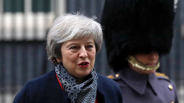 Britain's Prime Minister Theresa May prepares to welcome Japan's Prime Minister Shinzo Abe to Downing Street. Abe has expressed concerns about the effects of a no-deal Brexit.